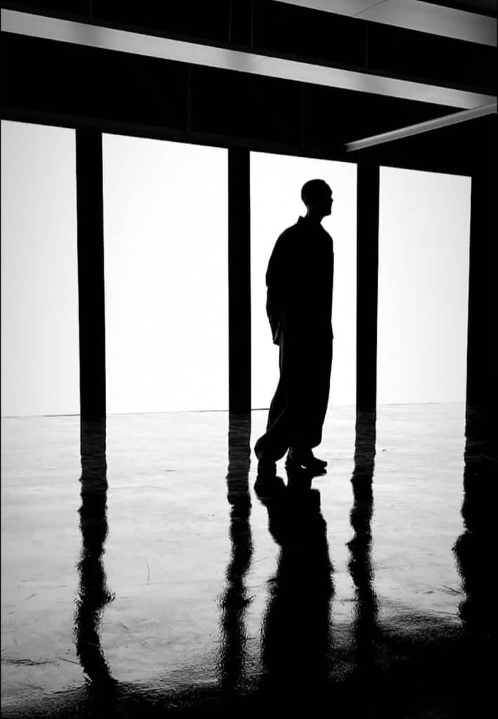 George Harvey Silhouette in front of LED Screen